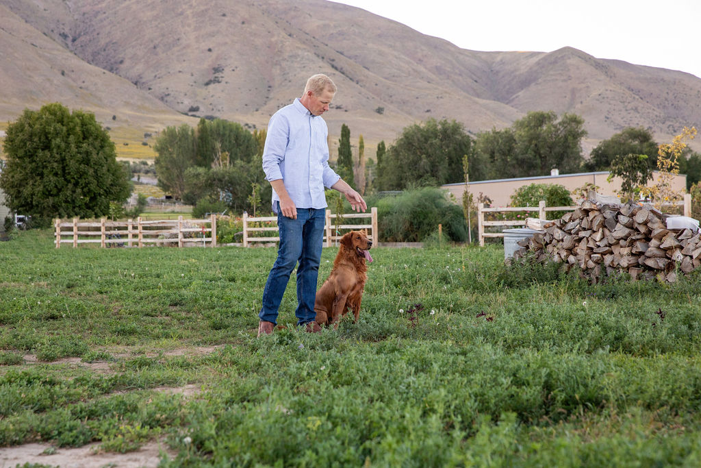 Tyce Erickson working a golden retriever during a training session